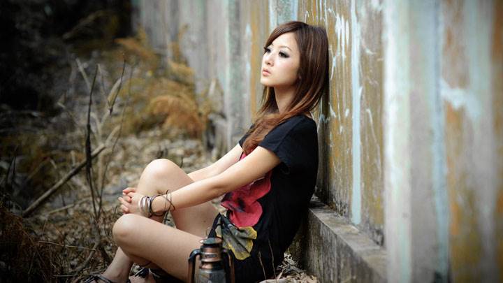 Girl Lost In Love – Sitting Pose in Black Top